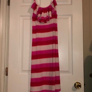 Worn once as cover up. Ruffles on the chest part.